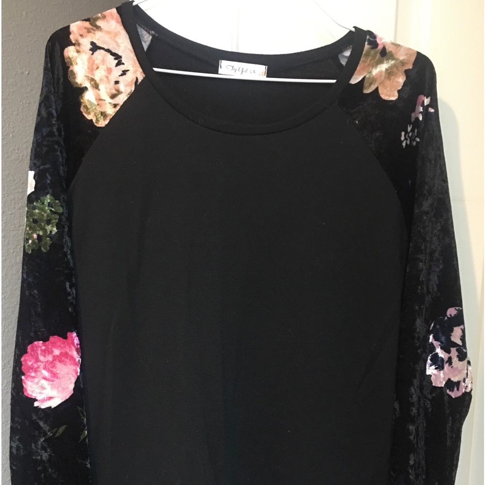 Top Girl LA brand; black top with velvet look sleeves; size small